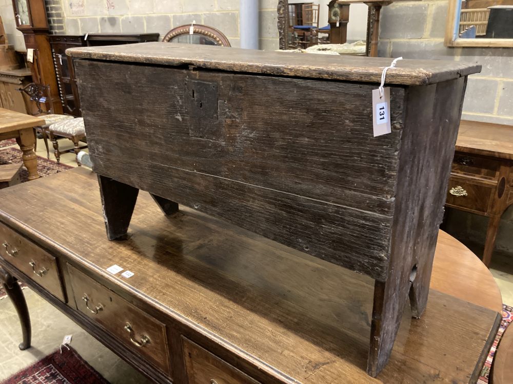 An 18th century oak panelled coffer, width 98cm depth 35cm height 60cm